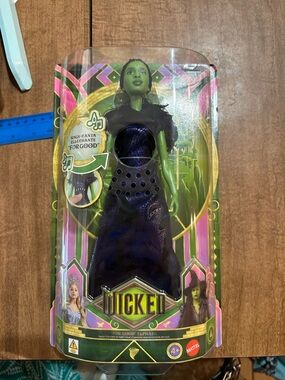 Mattel Wicked Doll Packaging in Green, Purple, Black and Gold